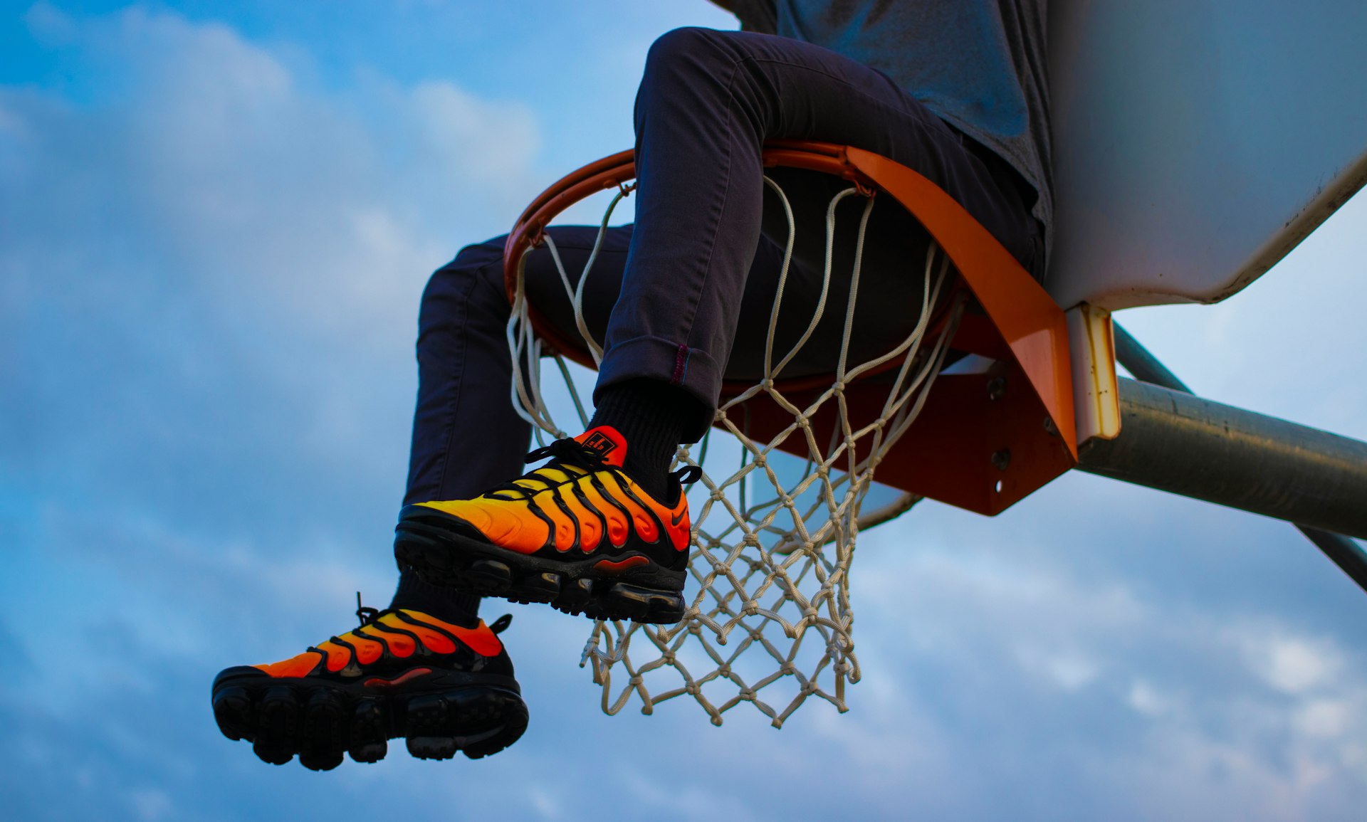 a basketball player dunking the ball into the hoop